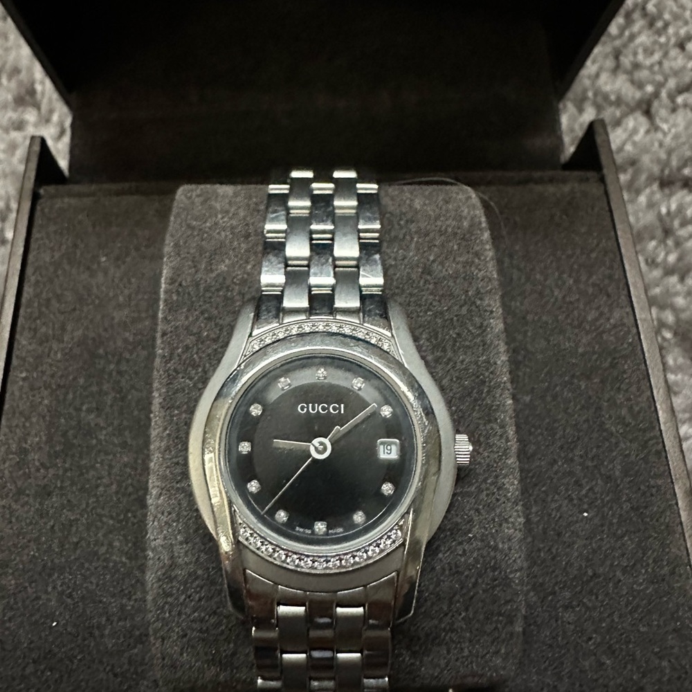 Authentic Gucci women watch with diamond accents